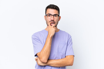 Young caucasian man isolated on white background nervous and scared