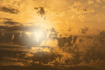 Beautiful sunset cloudscape with bright sun