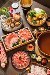 Seafood cuisine plate and beef sliced meat for hot pots. pork slices, scallops,  seashells, oysters, caviar and other seafood delicacies.