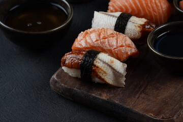 Japanese traditional Cuisine - Set of Nigiri sushi topped with  sake(Salmon), Maguro (Tuna), Unagi(Freshwater Eel)
