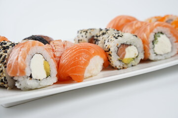 Japanese traditional Cuisine - Set of Nigiri sushi and sushi rolls