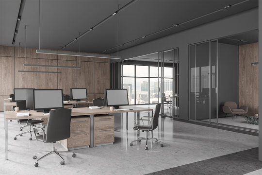 Grey office interior with workspace and lounge zone, panoramic window