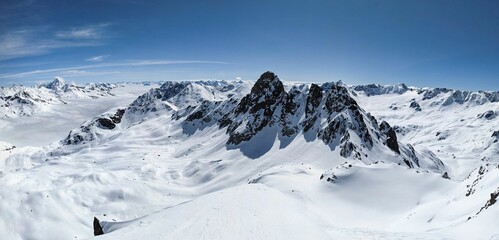 Back country ski tour on the Radüner Rothorn with a view of the Piz Radönt. Ski mountaineering...