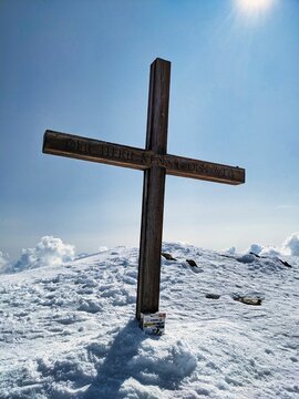Sustenhorn summit cross. High altitude ski tour over the Steigletscher to the summit. Mountaineering in spring. Skimo. High quality photo. Glacier, on top.