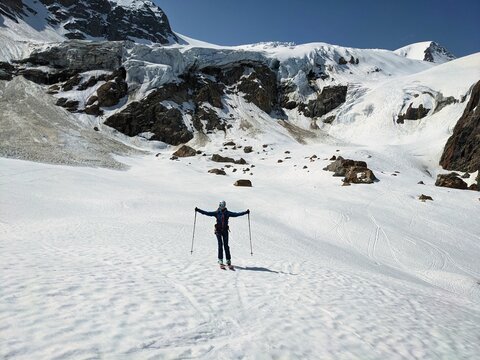 young woman on a ski tour up the sustenhorn on the steigletscher glacier. Breathtaking mountain landscape. mountaineering ski. High quality photo