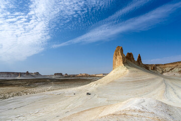 Ustyurt Plateau of Mangystau, Kazakhstan. Incredible desert scenery of a prehistoric seabed. One car in the foreground