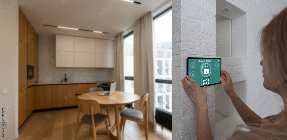 Poster controlling home with a digital touch screen panel installed on the wall in the living room. concept