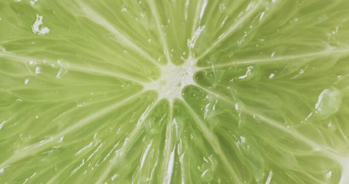 Video of closed up of sliced lime with copy space