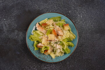 Caesar Salad with chicken fillet, croutons, Parmesan Cheese,  Yogurt Mayonnaise Sauce, traditional Italian food