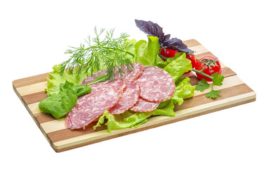 Sausages with salad and basil