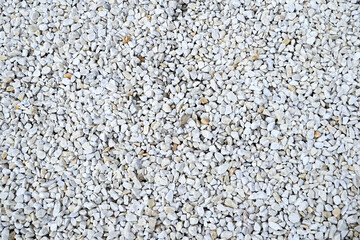 Texture of small white stones. Stones for landscape design