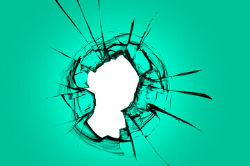 A hole in green glass. Broken window with cracks texture, effect for design solutions.