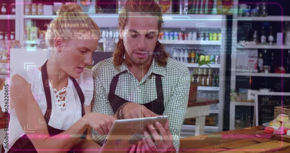 Aufkleber animation of computer language over caucasian coworkers using digital tablet in cafe