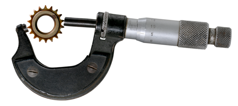 A micrometer that measures a gear shown skewed to show measurement errors.