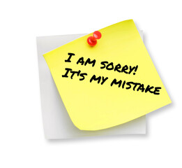 Sticky note with phrase I Am Sorry! It's My Mistake pinned on white background