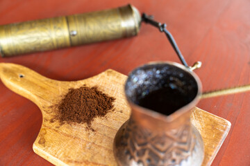 Vintage coffee pot and manual coffee grinder. Retro style of making natural espresso