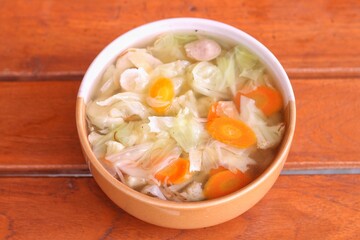 Bowl of delicious vegetable soup on a table