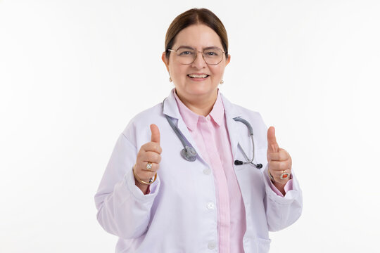 Senior Indian Female Doctor showing thumbs up on white background
