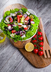Composition with a vegetable salad bowl