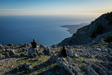 Epic scenery with hiker on top of Mount Ainos, the tallest mountain on the Ionian island of...