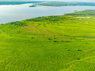 Fototapeta na wymiar Photos of the river island were taken from a drone. Bolshoy Ussuriysky Island is a large river island on the Amur River and below the mouth of the Ussuri in the Khabarovsk Territory. 