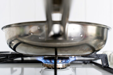 stainless steel pan on gas stove