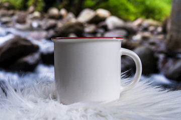 The mockup highlights a white blank mug, tastefully arranged in the natural setting, exuding timeless appeal