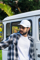 The mockup exhibits a man in a white hat, effortlessly striking a simple pose, for visual marketing