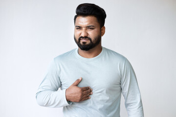 Acid Reflux and Heartburn, Sick South Asian Man Experiencing GERD Symptoms