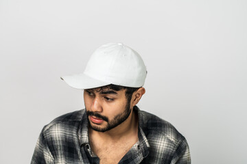 Skillfully arranged for mockup purposes, the image showcases a man wearing a white hat, creating captivating presentations