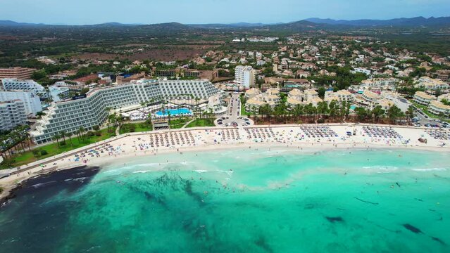 Aerial view of Sa Coma beach in Mallorca Spain on a summer day