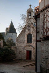 Fototapeta na wymiar Old castle and church in Josselin, Brittany, France