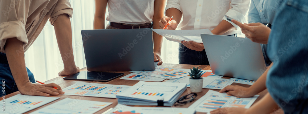 Aufkleber analyst team utilizing bi fintech to analyze and pointing at financial dashboard paper office. busin