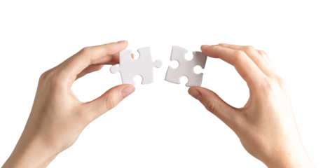 Hand joining, connecting two puzzle pieces together. Business and psychology concept of problem solving, success