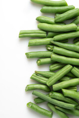Fresh chopped green beans isolated on white background