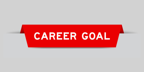 Red color inserted label with word career goal on gray background
