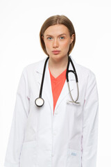 Fototapeta premium Beautiful girl doctor professional in work clothes on white background 