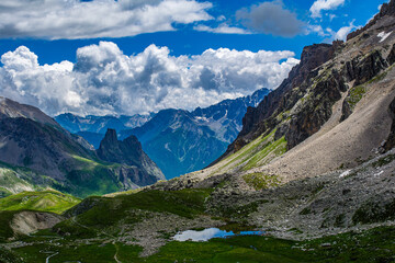 Fototapeta na wymiar Trekking in Alta Valle Maira. Da Chiappera al Colle del Maurin ai piedi della Rocca Provenzale