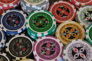 Poker chips piled up on table