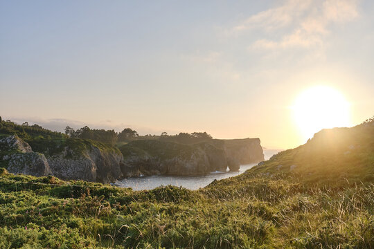 sunset landscape of the coast and cliffs in Asturias, Spain. Hell Cliffs Trail