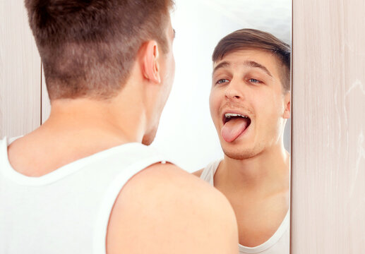 Young Man near the Mirror