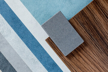 samples of finishing materials, close-up view, including various wooden laminates, interior...