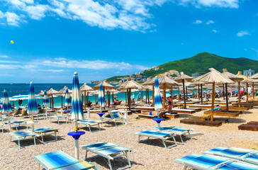 Fototapeta na wymiar beautiful view of the sea beach and resort town, mountains, panorama of Budva in Montenegro, Adriatic Sea, tourism and summer travel