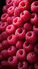 Delicious fresh and juicy raspberries from the garden.. Perfect for wallpaper, background, posters, prints or video. This is a generative picture.