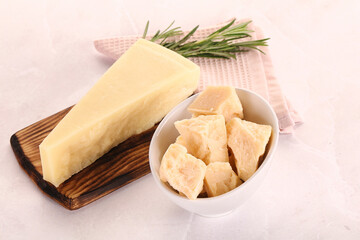 Chopped Italian hard parmesan cheese