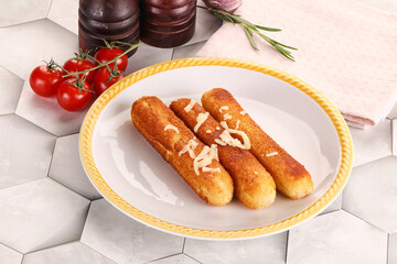 Fried cheese sticks for snack