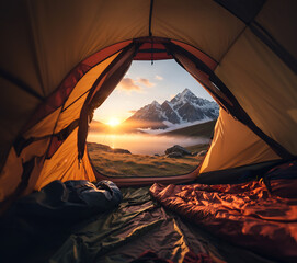 tent in the mountains at the sunset