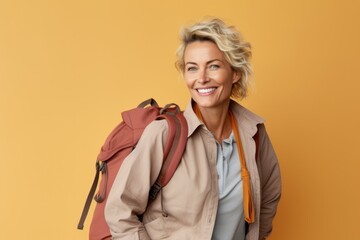 Fictional blonde woman smiling and traveling with backpack. Isolated on a colored background.  Generative AI.