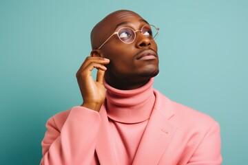 Fictional bald black man with glasses. Isolated on a colored background.  Generative AI.