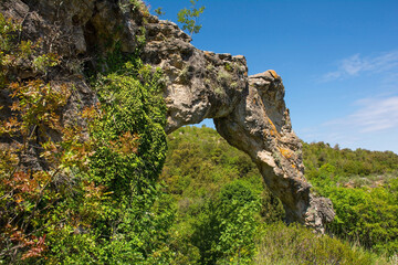 Kolac Rock Arch near Nerezisca on Brac Island, Croatia. A result of a mixture of steambank, wind,...